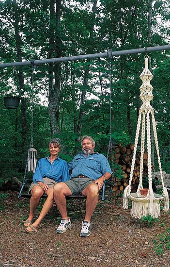 Hanuman and her husband, Ray, spend many peaceful moments in the garden surrounding the house. Hanuman had fond memories of her grandmother’s porch swing but lacked a porch on which to replicate it. So she hung the swing, a table, and plants on a pipe that her father hoisted between two trees.